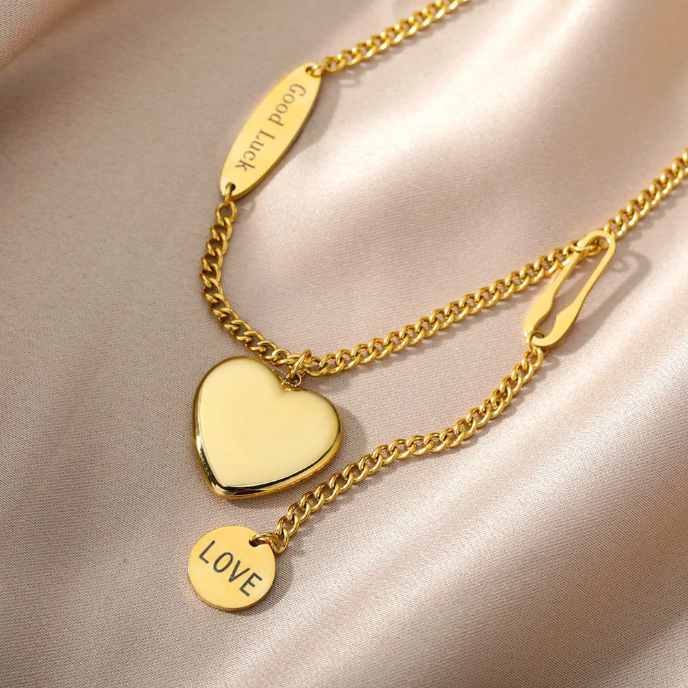 Multilayer heart pendant necklace with moon and star zircon accents on copper O-ring chain