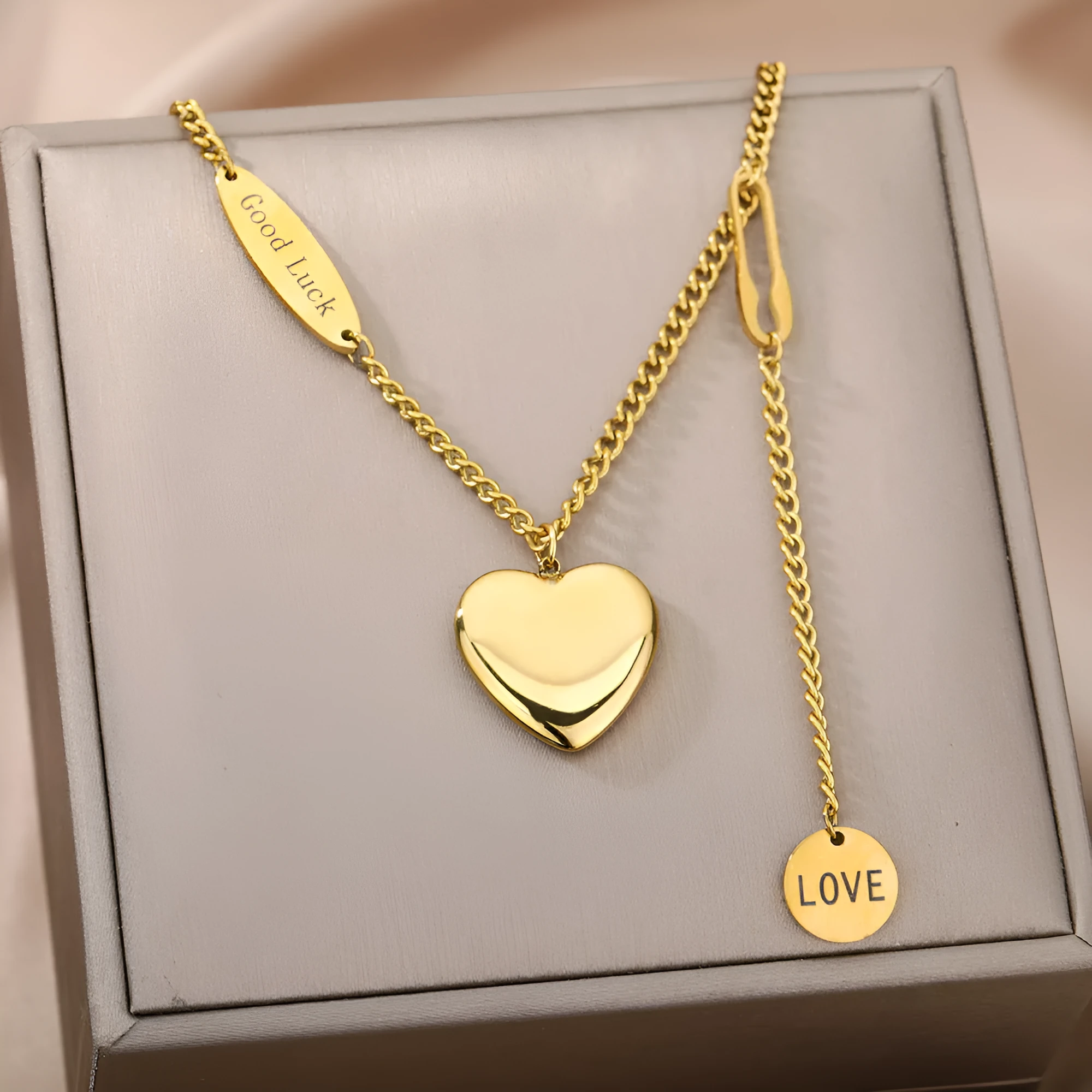 Multilayer heart pendant necklace with moon and star zircon accents on copper O-ring chain