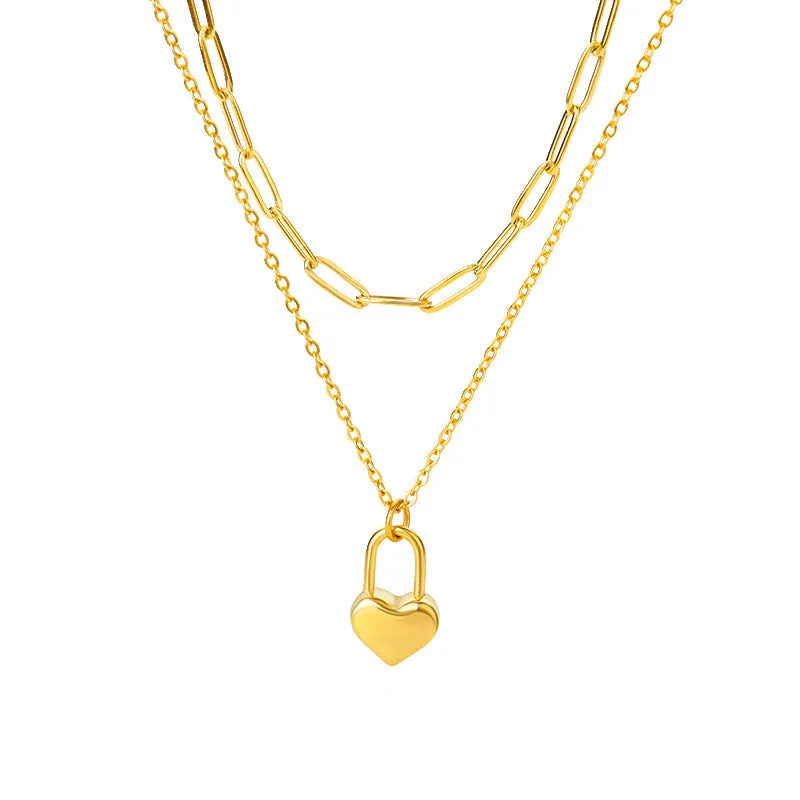 Multilayer heart pendant necklace with moon and star zircon accents on copper O-ring chain