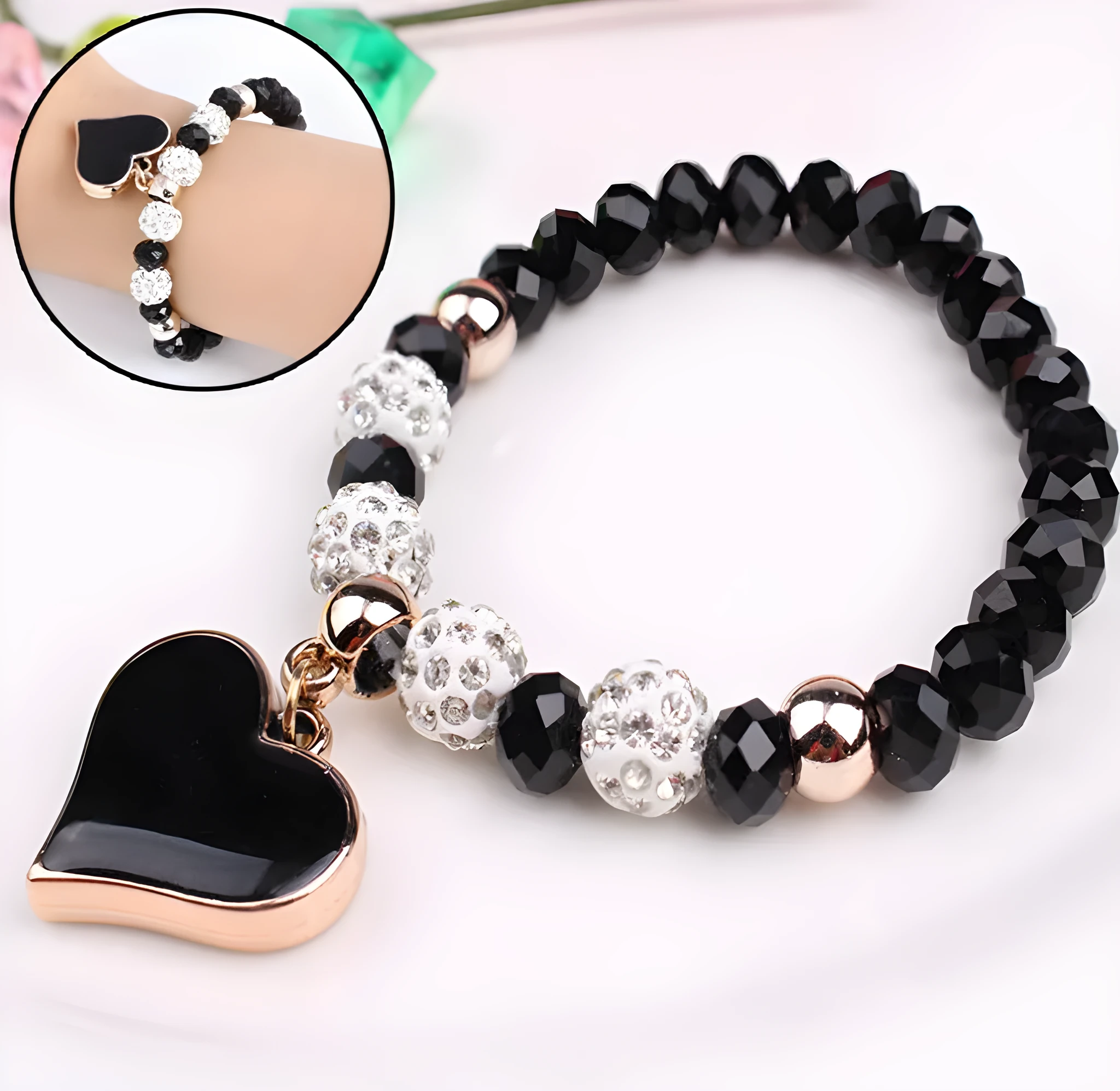 Elastic crystal bracelet and bangle heart bracelet in pink colour on white background
