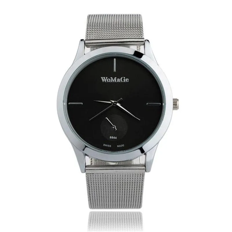 Unisex alloy mesh quartz watch with round silver case and dial on wrist