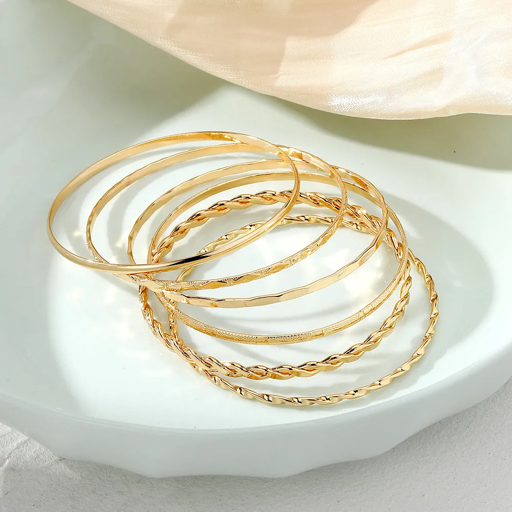 Gold tone bohemian metal chain bracelet set for women with geometric links and musical note bangles