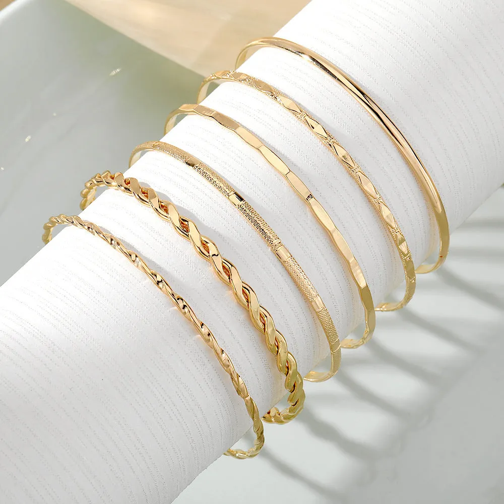 Gold tone bohemian metal chain bracelet set for women with geometric links and musical note bangles