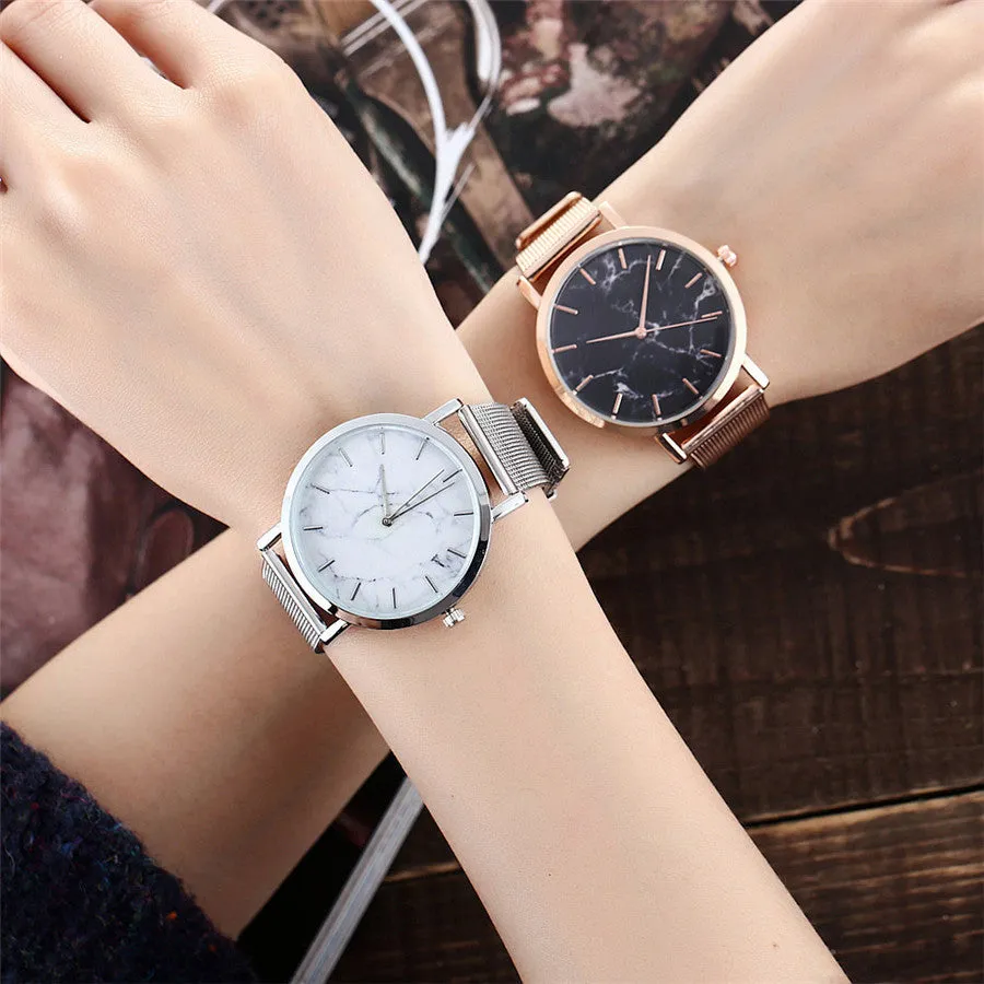Vansvar women's quartz watch with silver mesh band and marble dial