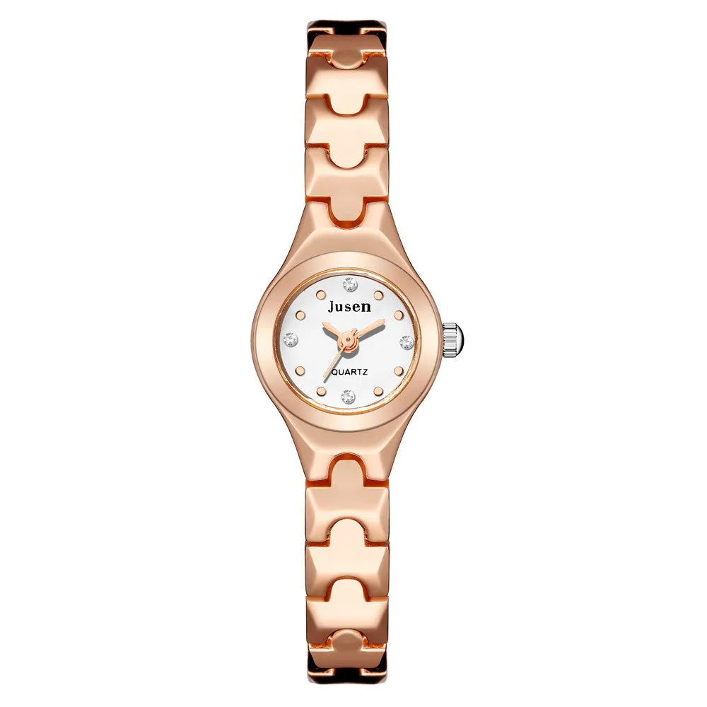 Small round ladies quartz watch with alloy bracelet and gold-tone finish on white background