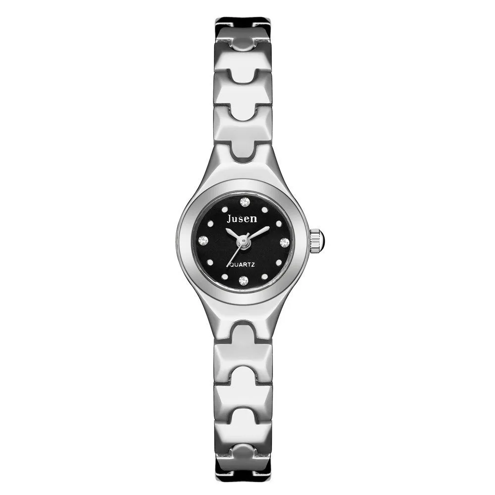 Small round ladies quartz watch with alloy bracelet and gold-tone finish on white background