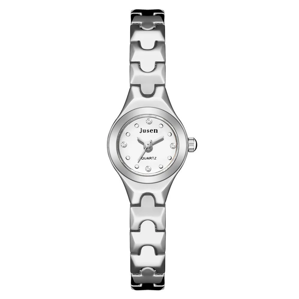 Small round ladies quartz watch with alloy bracelet and gold-tone finish on white background