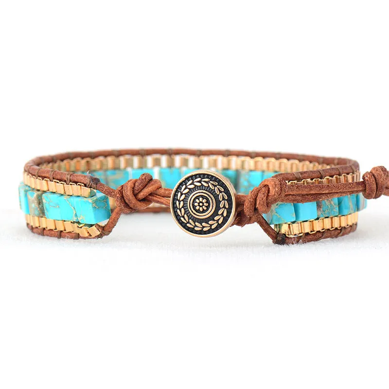 Blue hand-woven leather bracelet with geometric pattern on neutral background