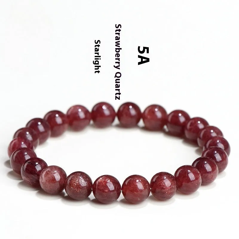 A stretch bracelet with round, pink strawberry quartz beads on an elasticated cord, shown in different size options.