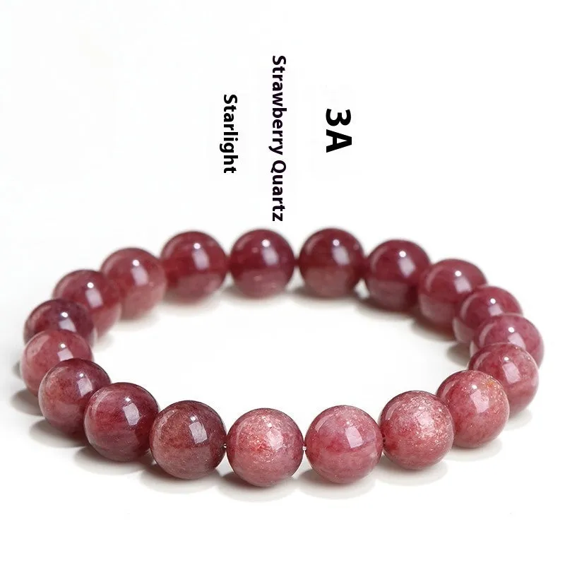 A stretch bracelet with round, pink strawberry quartz beads on an elasticated cord, shown in different size options.