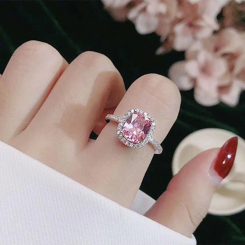 Silver alloy ring with artificial gemstone geometric inlay on white background
