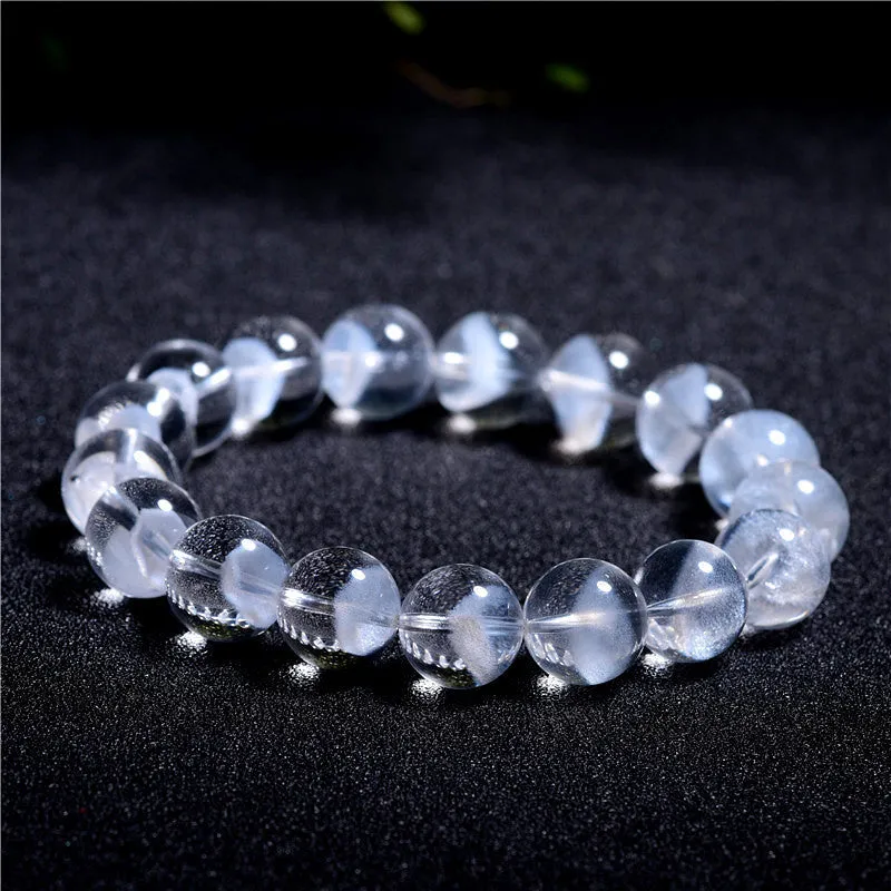 Women's white crystal ghost bracelet with a ruyi element, showing adjustable bead sizes.