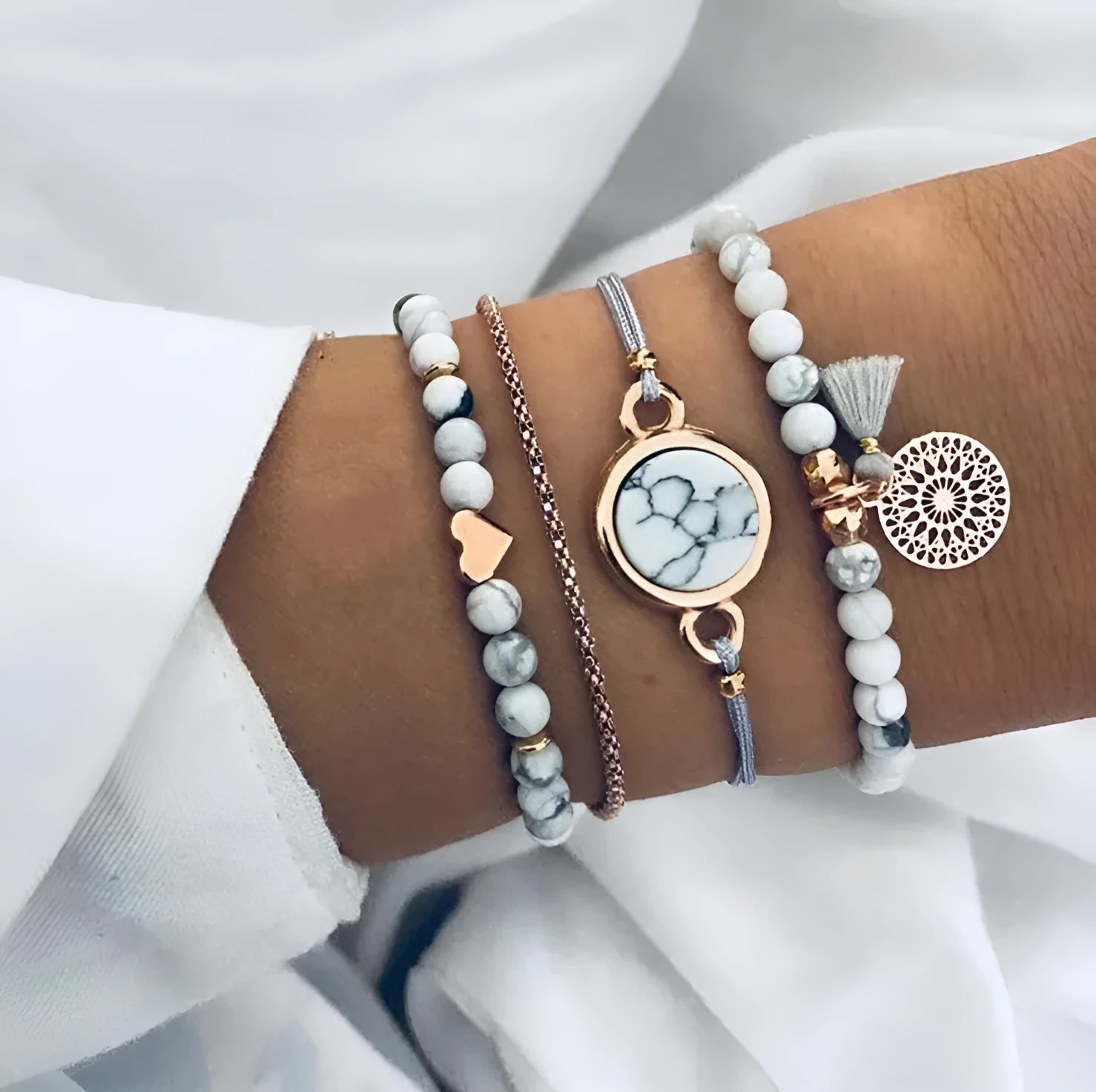 Geometric creative hollow fringed pine stone bracelet four-piece set in white alloy with electroplated finish