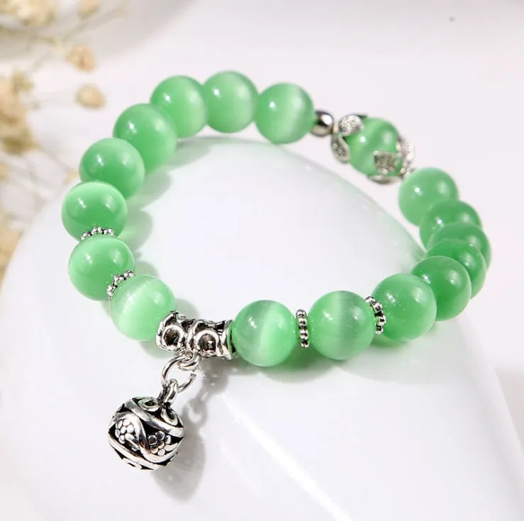 Natural opal beads charm bracelet with crystal accents on stainless steel chain, 17cm, in black colour