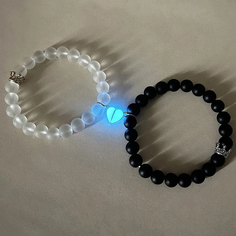2pcs handmade glow-in-the-dark crown beaded bracelets in white and black with glass beads and luminous heart charm