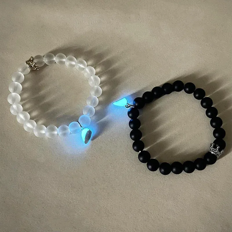 2pcs handmade glow-in-the-dark crown beaded bracelets in white and black with glass beads and luminous heart charm