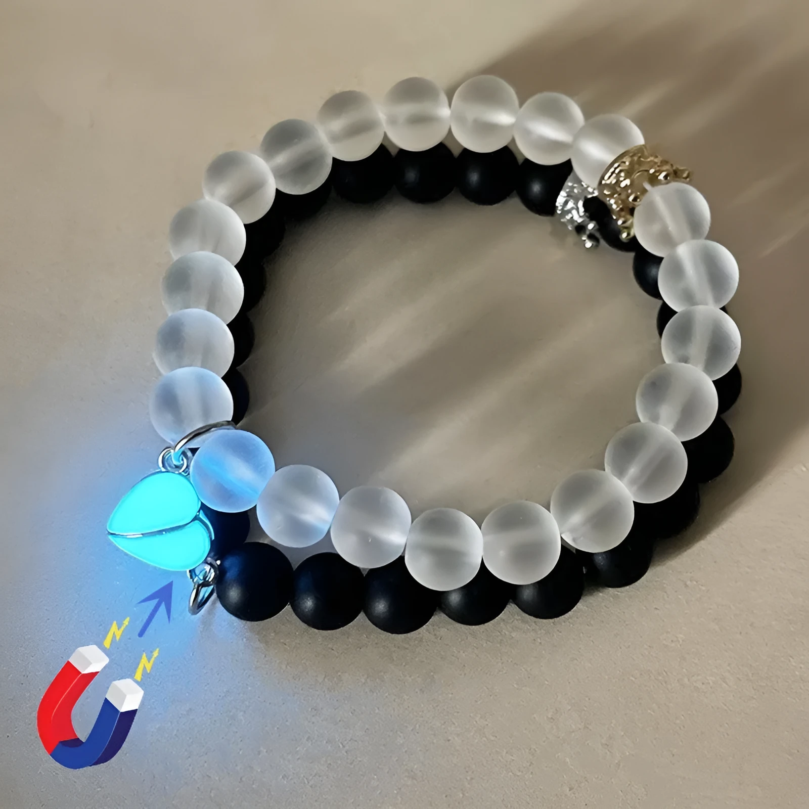 2pcs handmade glow-in-the-dark crown beaded bracelets in white and black with glass beads and luminous heart charm