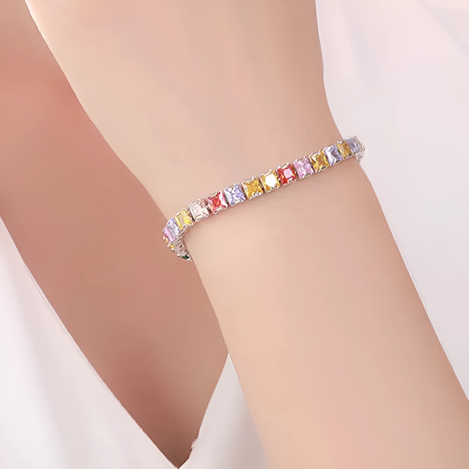 Square geometric zircon bracelet for women with electroplated platinum finish.