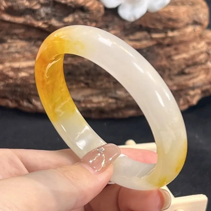 Geometric carved natural topaz bracelet with 12mm beads on white background