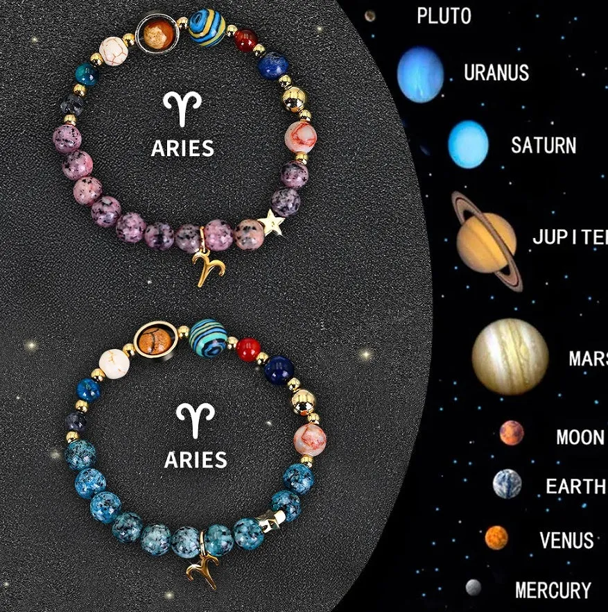 Two natural stone beaded bracelets with different zodiac sign designs laid flat.