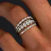 Round copper ring set with cubic zirconium electroplated finish in gold white diamond colour unisex style