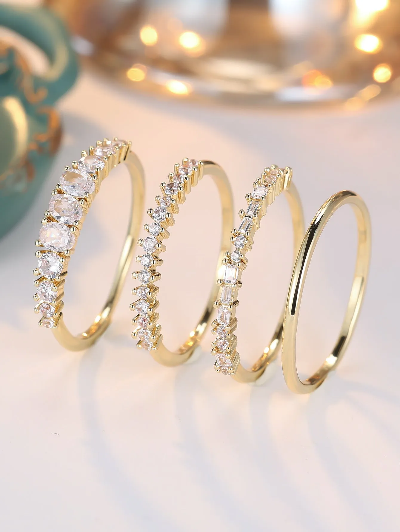 Round copper ring set with cubic zirconium electroplated finish in gold white diamond colour unisex style