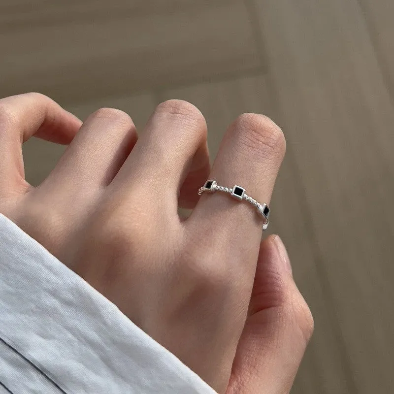 Adjustable copper love heart-shaped ring with electroplated finish on white background