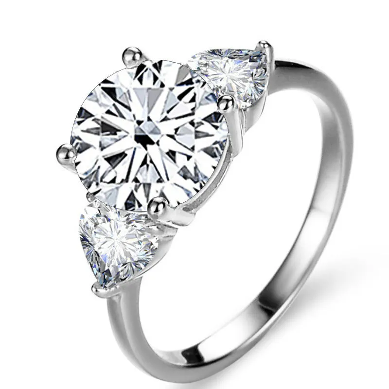 Sterling silver ring with 10mm round 3 karat moissanite stone in white colour on white background