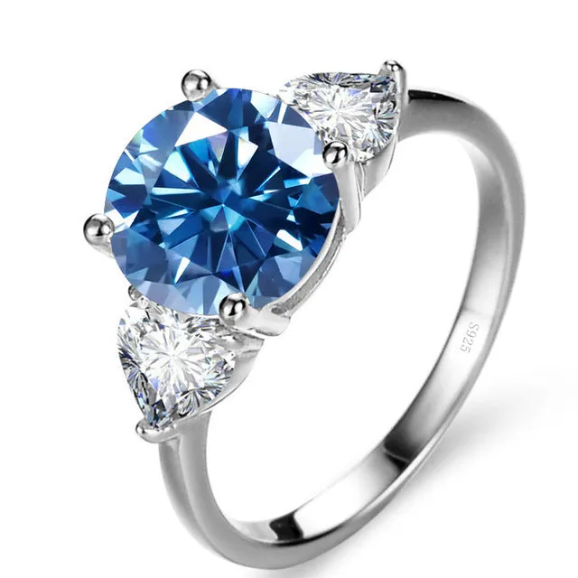 Sterling silver ring with 10mm round 3 karat moissanite stone in white colour on white background