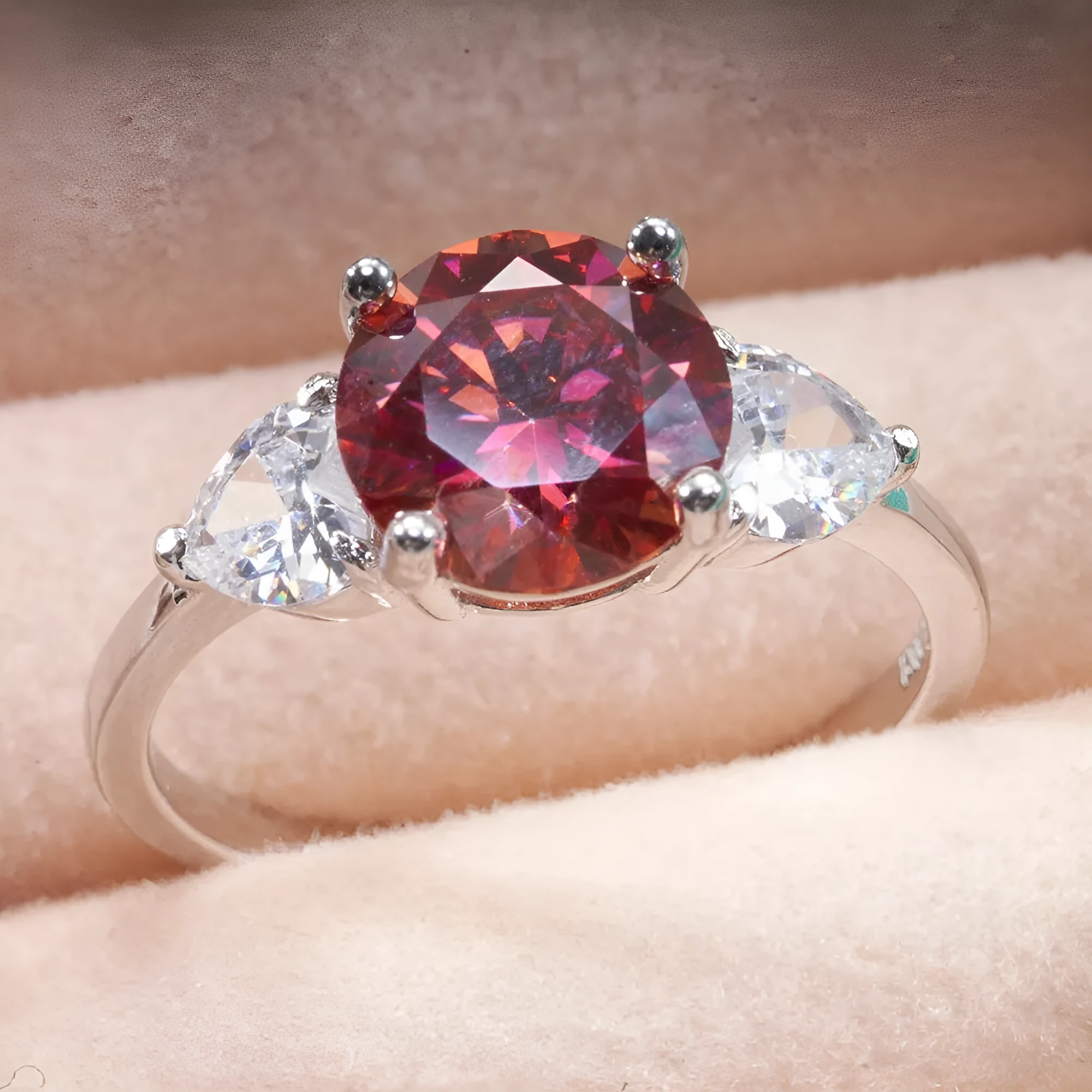 Sterling silver ring with 10mm round 3 karat moissanite stone in white colour on white background