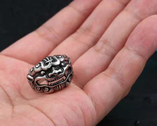 Men's titanium steel ring with vintage kirin design, polished silver finish, wide 23.5mm band