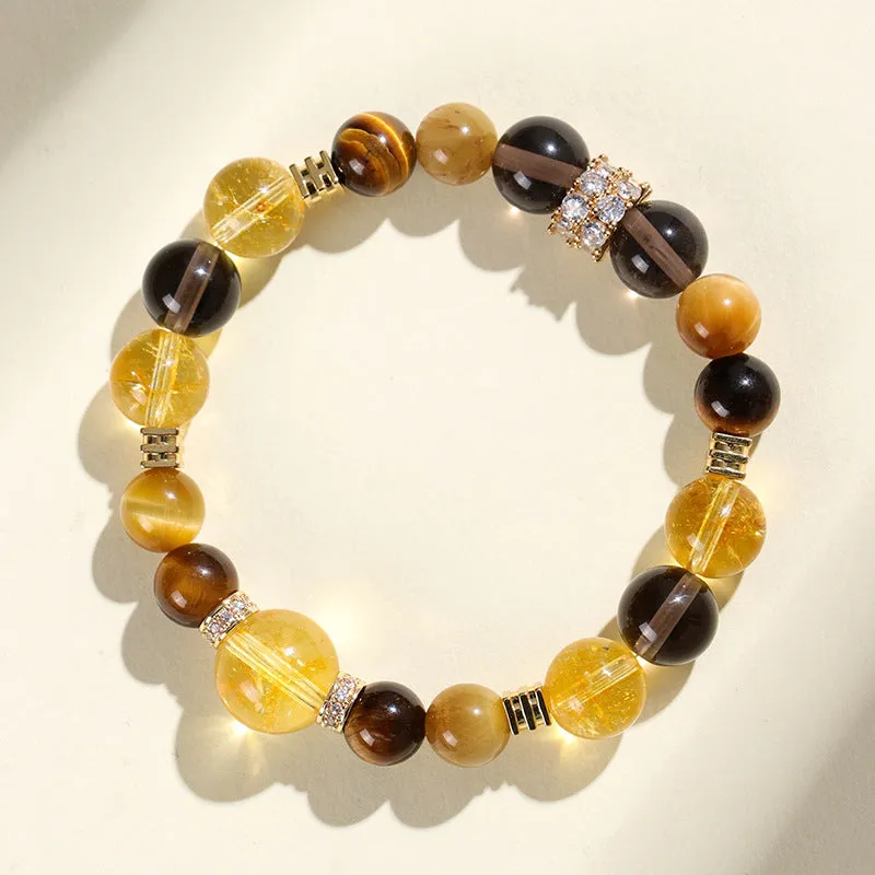 Close-up of a natural yellow artificial crystal bead bracelet with 10mm tower-shaped beads on a string.