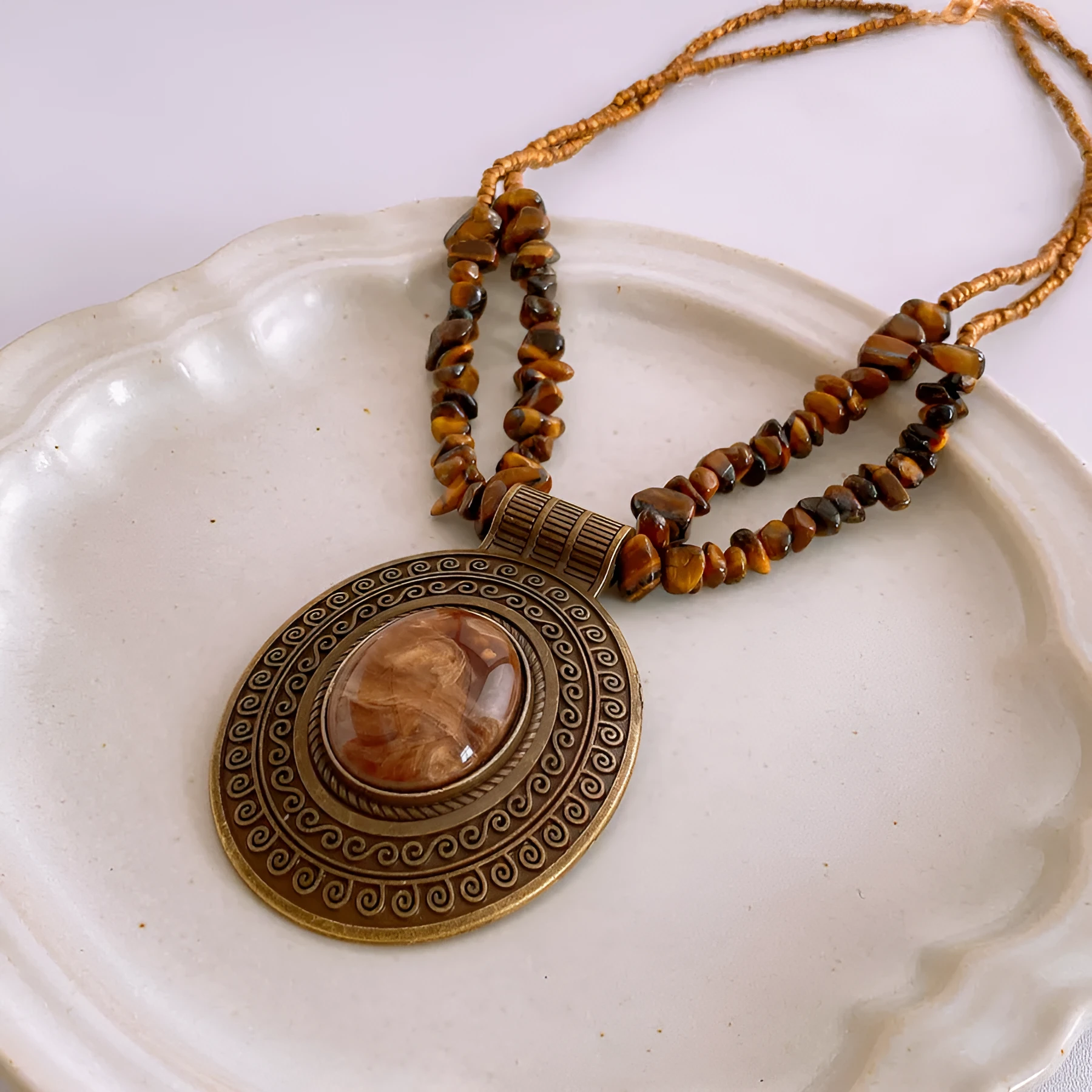 Irregular tiger eye stone oval pendant necklace with electroplated alloy chain, brown colour, clavicle length, retro antique style
