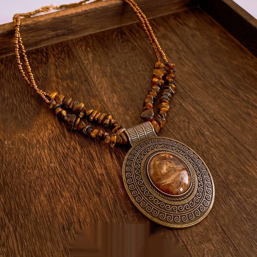 Irregular tiger eye stone oval pendant necklace with electroplated alloy chain, brown colour, clavicle length, retro antique style
