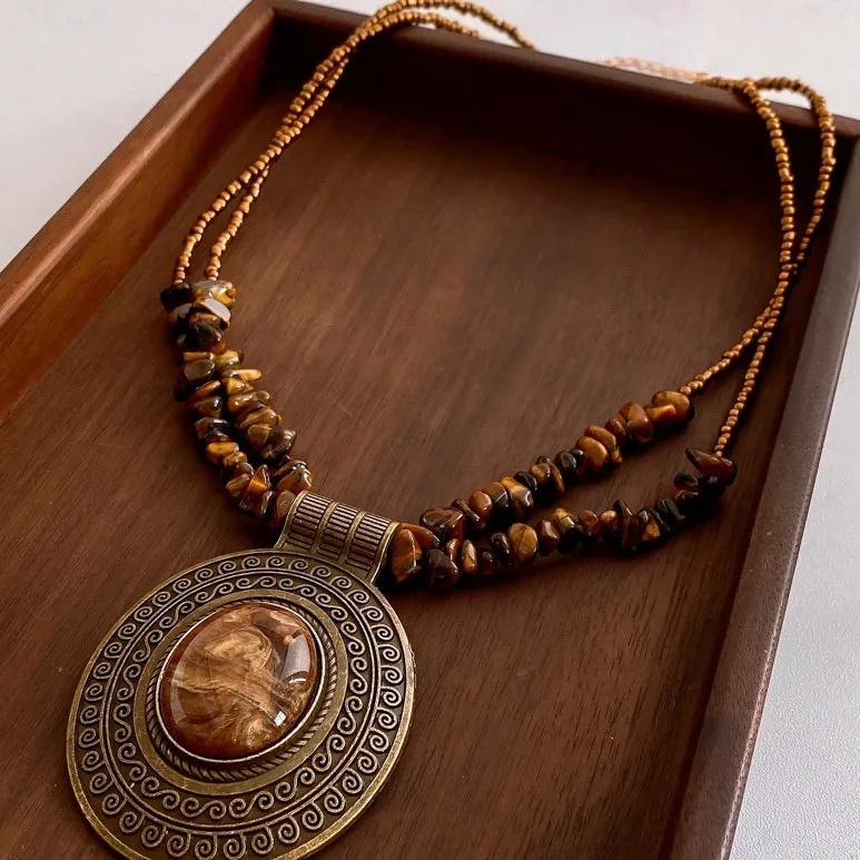 Irregular tiger eye stone oval pendant necklace with electroplated alloy chain, brown colour, clavicle length, retro antique style