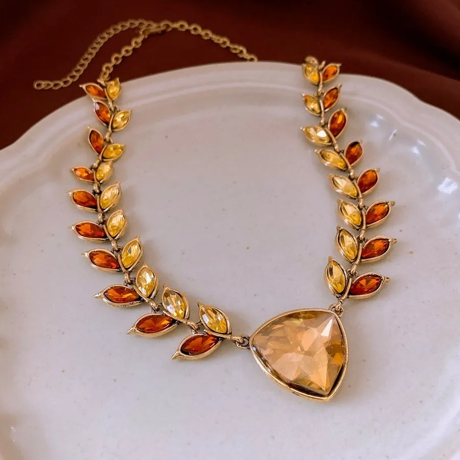 Flower shape alloy pendant necklace and earrings set in golden brown with green accents, 51-60cm adjustable chain, retro wheat design