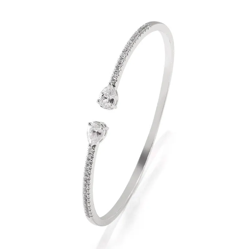 Copper multi-zircon bracelet with simple style in white colour option showing inlaid zircon treatment