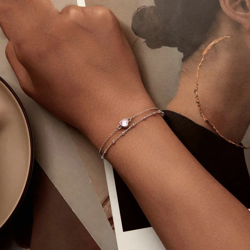 Sweet girlish 925 sterling silver bracelet with heart-shaped pendant on adjustable chain
