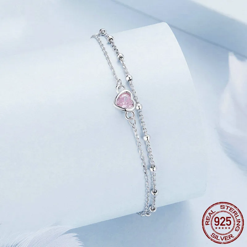 Sweet girlish 925 sterling silver bracelet with heart-shaped pendant on adjustable chain
