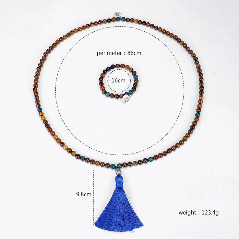 Handmade tiger eye stone bead necklace with Buddha head pendant and tassel on women model
