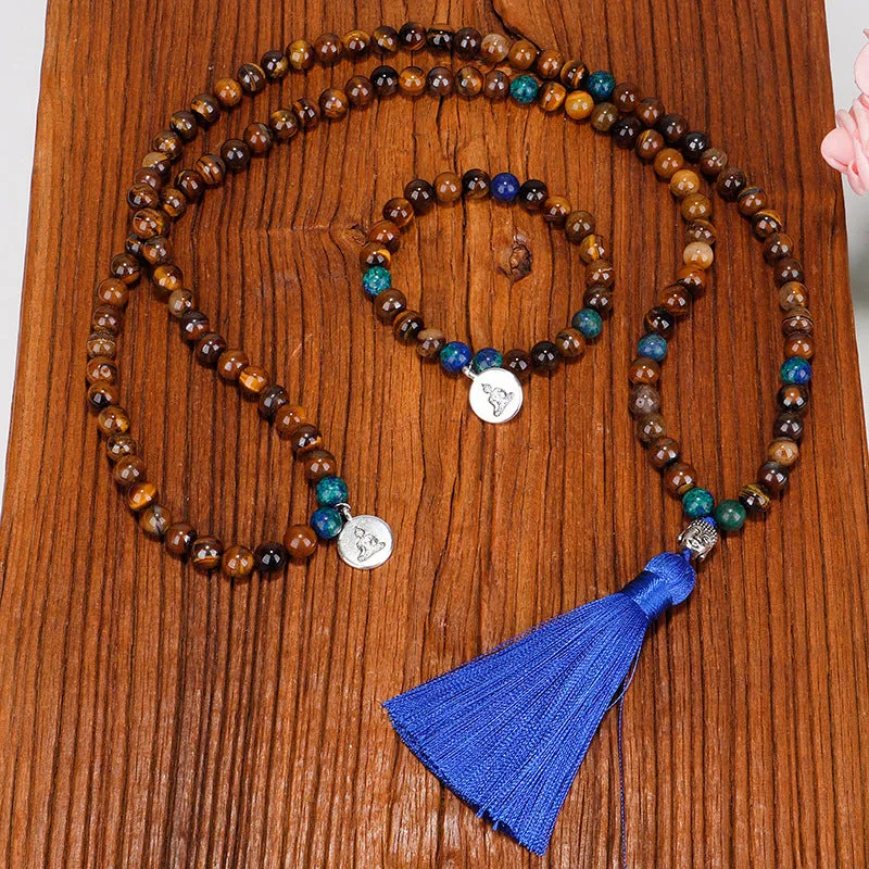 Handmade tiger eye stone bead necklace with Buddha head pendant and tassel on women model