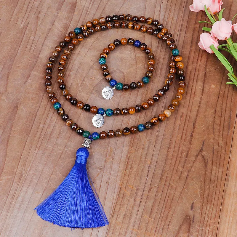 Handmade tiger eye stone bead necklace with Buddha head pendant and tassel on women model