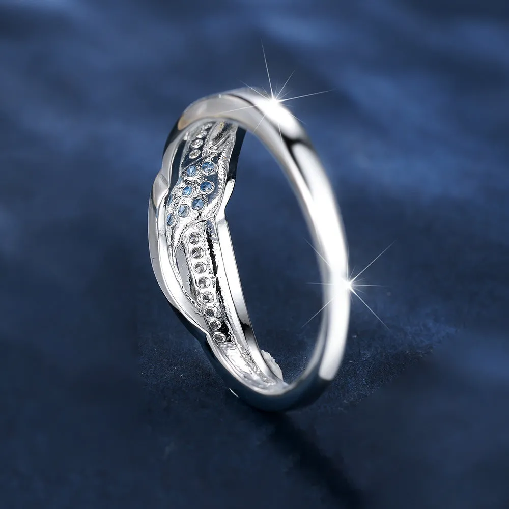Women's ring with sea blue diamond edge inlay and white diamond leaf accents on white K plated copper band, simple geometric style