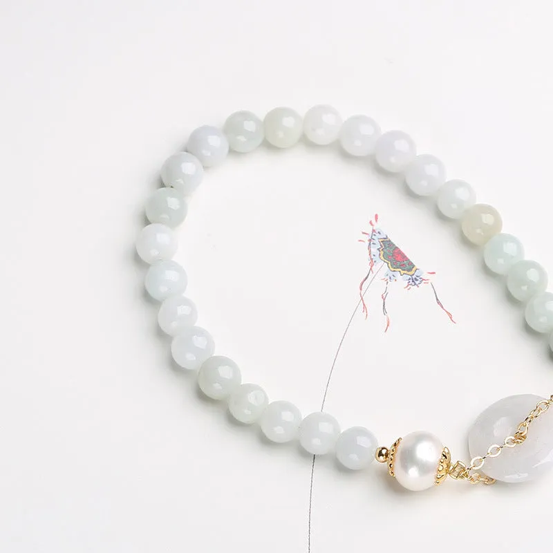 Handcrafted jade pearl bracelet with peace buckle closure in traditional Chinese style