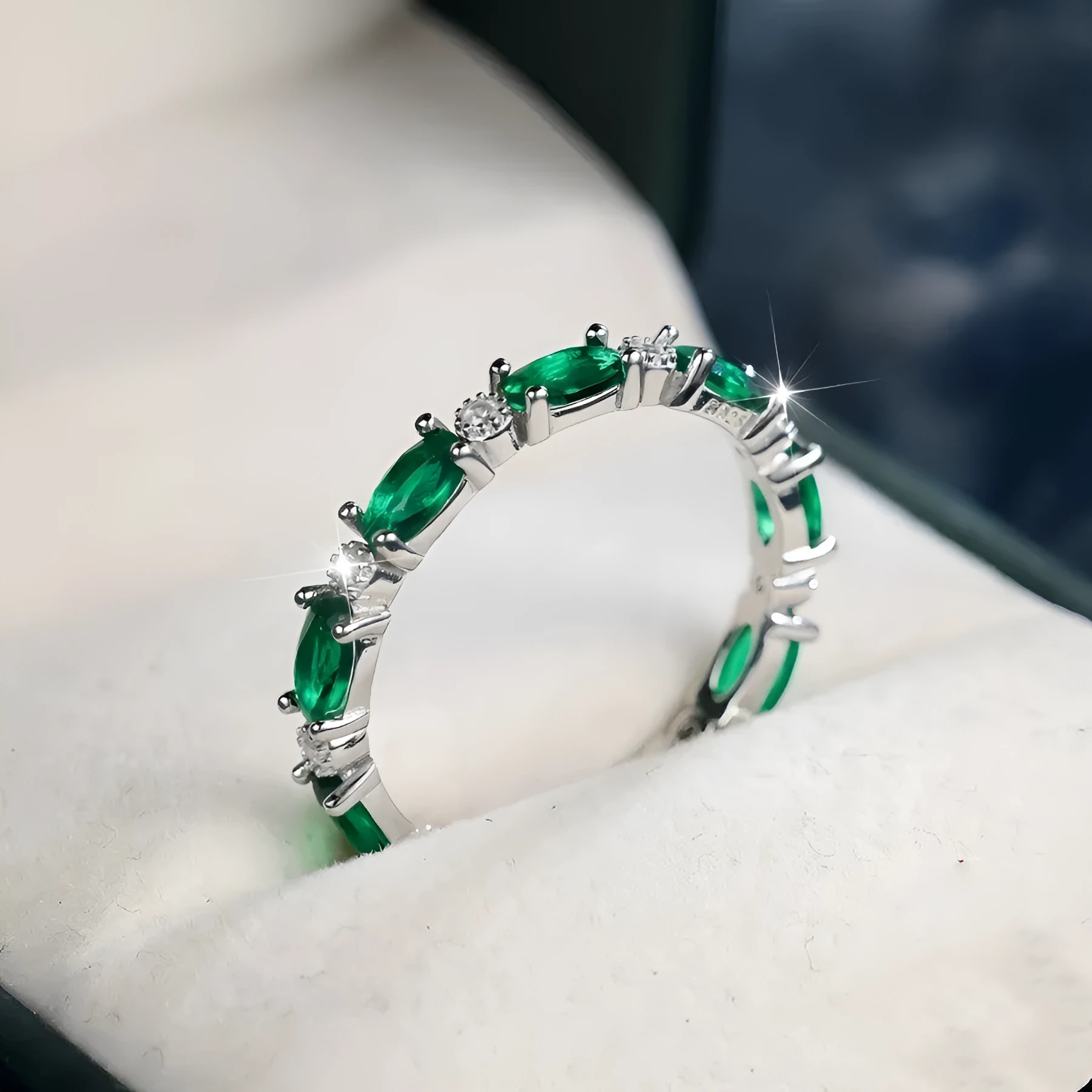Copper ring with green and white zircon inlay geometric design on finger