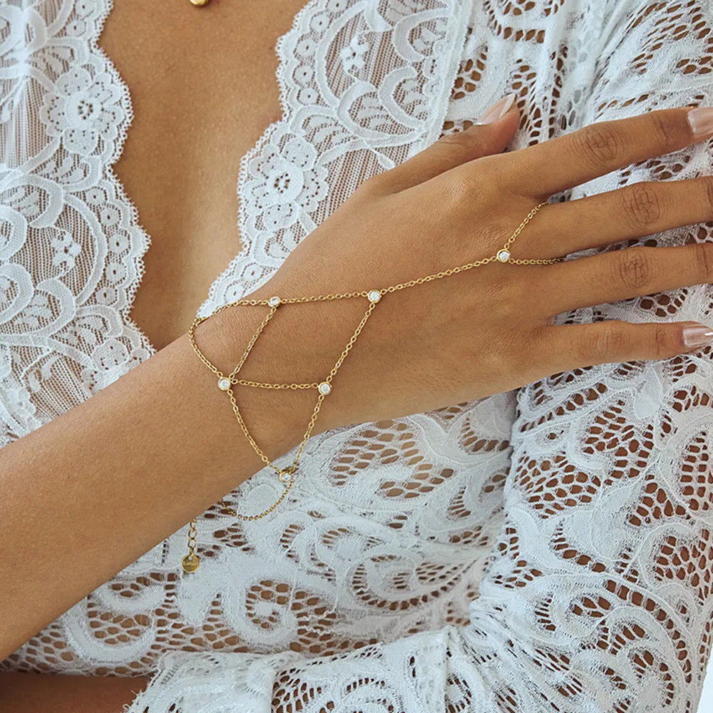 Zircon mitten-type bracelet with tassel, light luxury, stainless steel, round geometry for women.