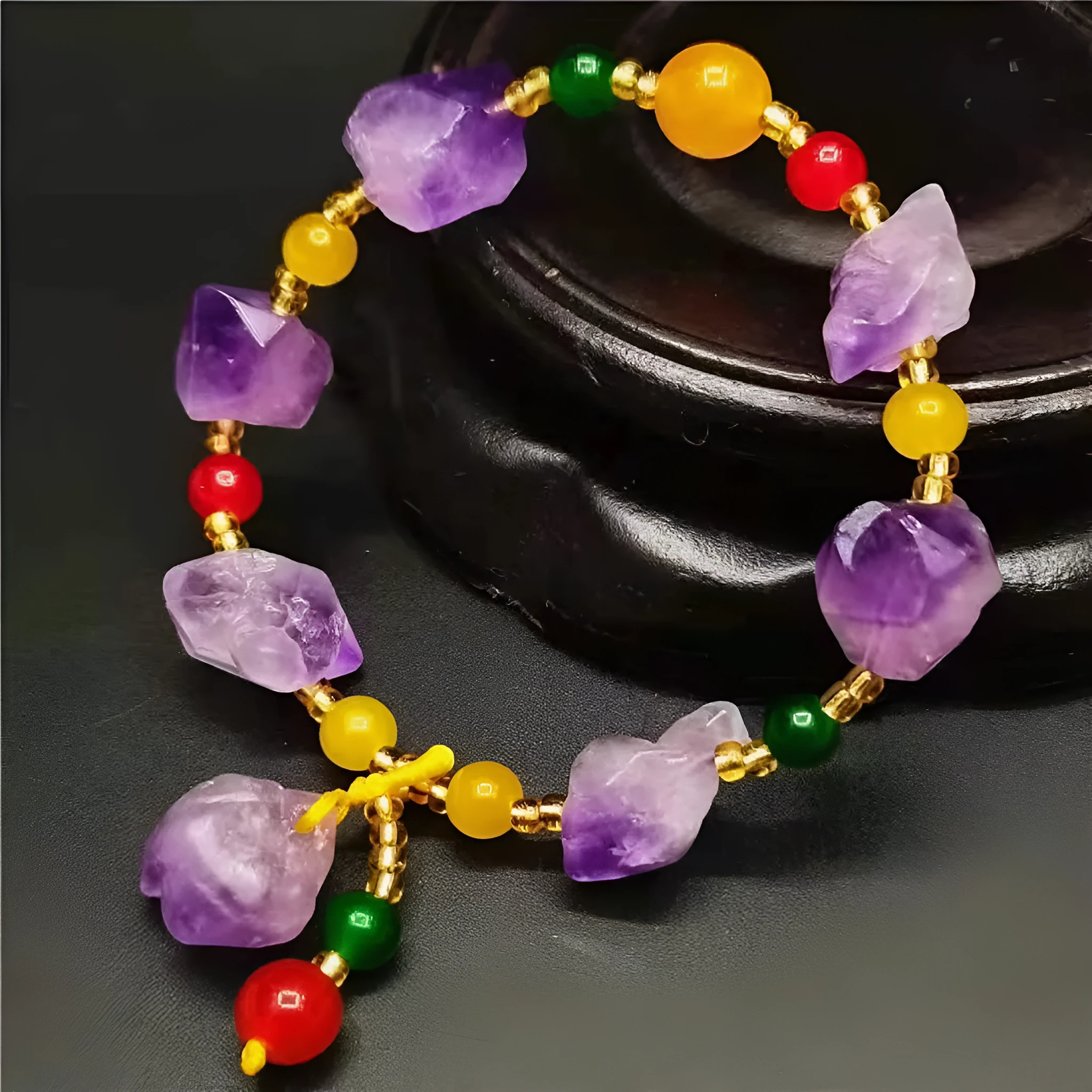 Natural shaped purple amethyst bead bracelet for women with a fu character charm.