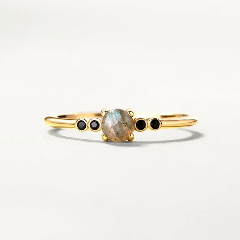 Gold coloured open ring with geometric round shape on silver base with electroplating