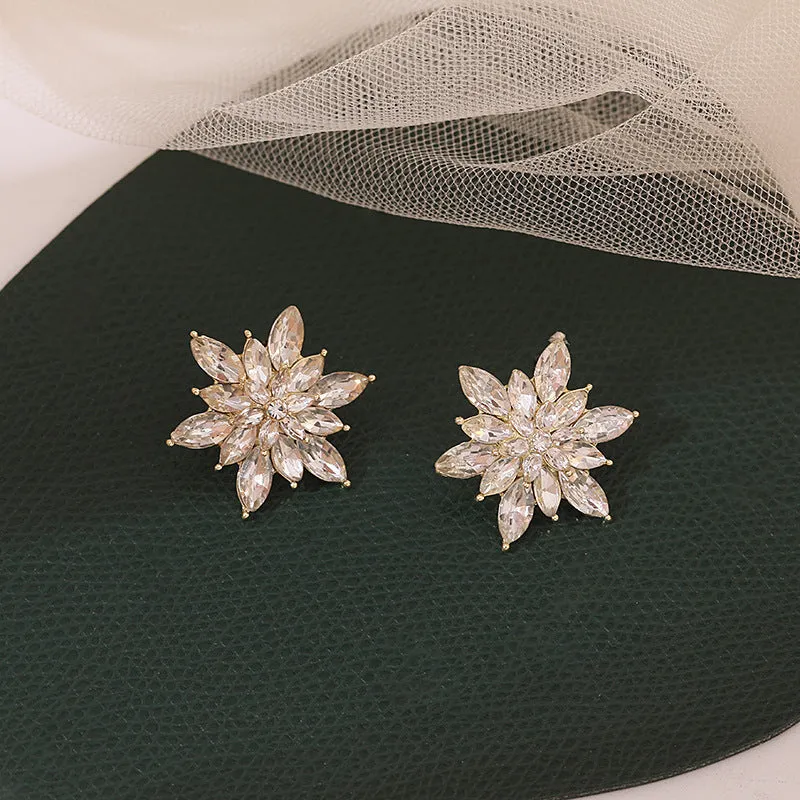 Super shiny crystal zircon multi-layer three-dimensional flower earrings in white alloy with leaf and petal details