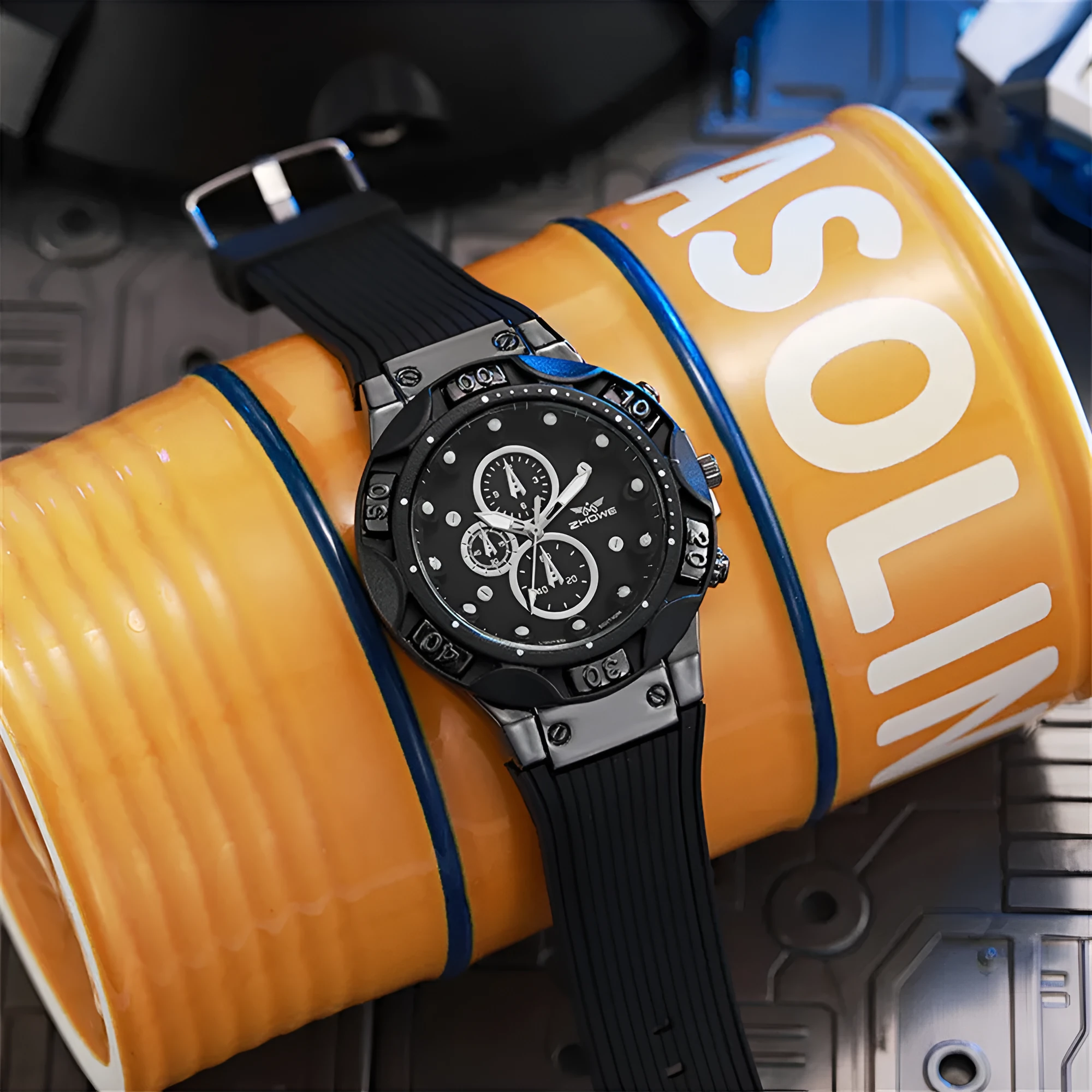 Men's sports quartz watch with 45mm round alloy case and black silicone strap on a white background